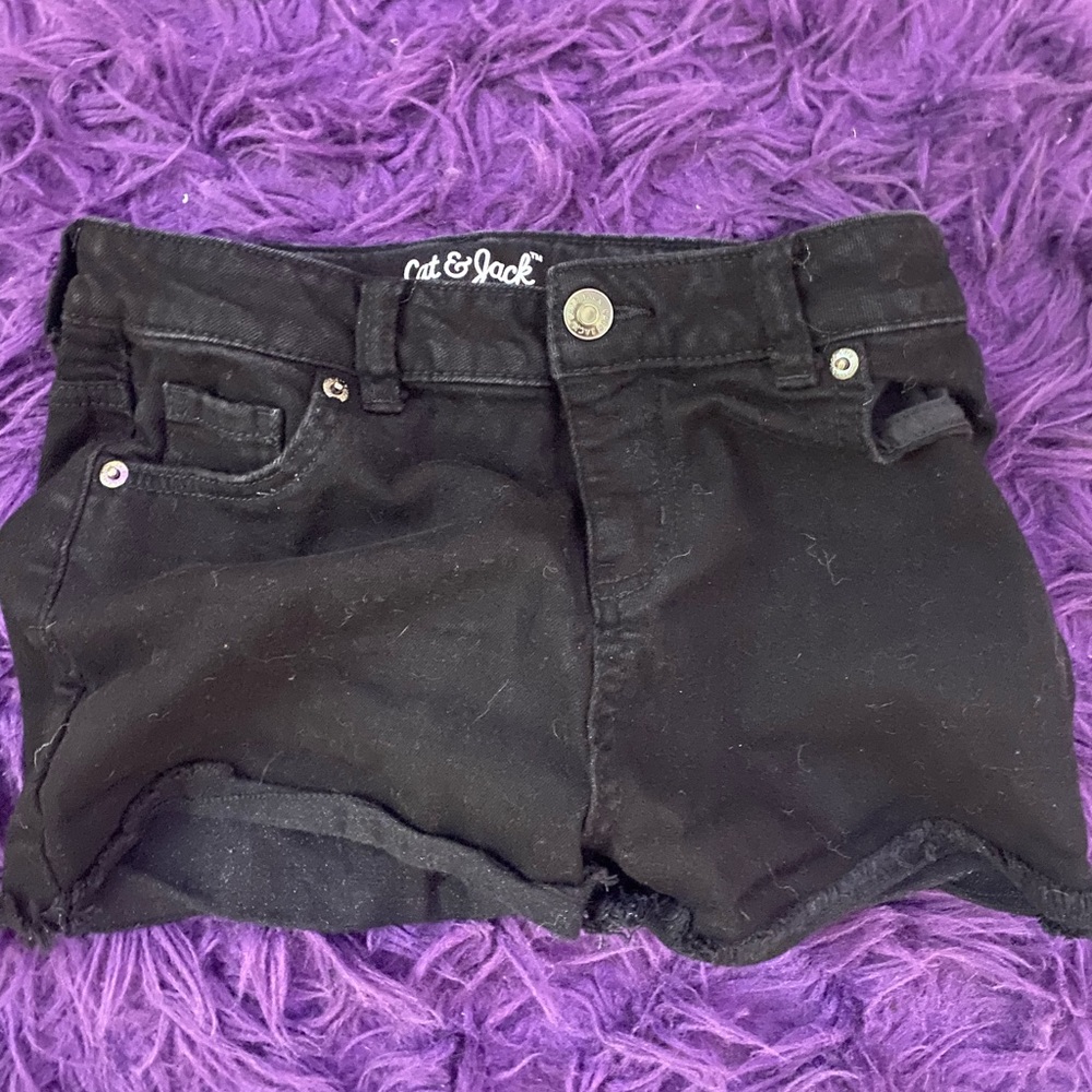 Black shorts.